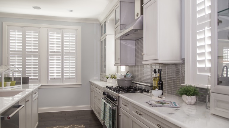 Polywood shutters in Miami kitchen with modern appliances.